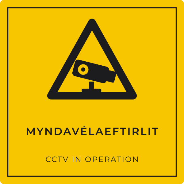 Myndavélaeftirlit – grafið viðvörunarskilti, íslenska og enska