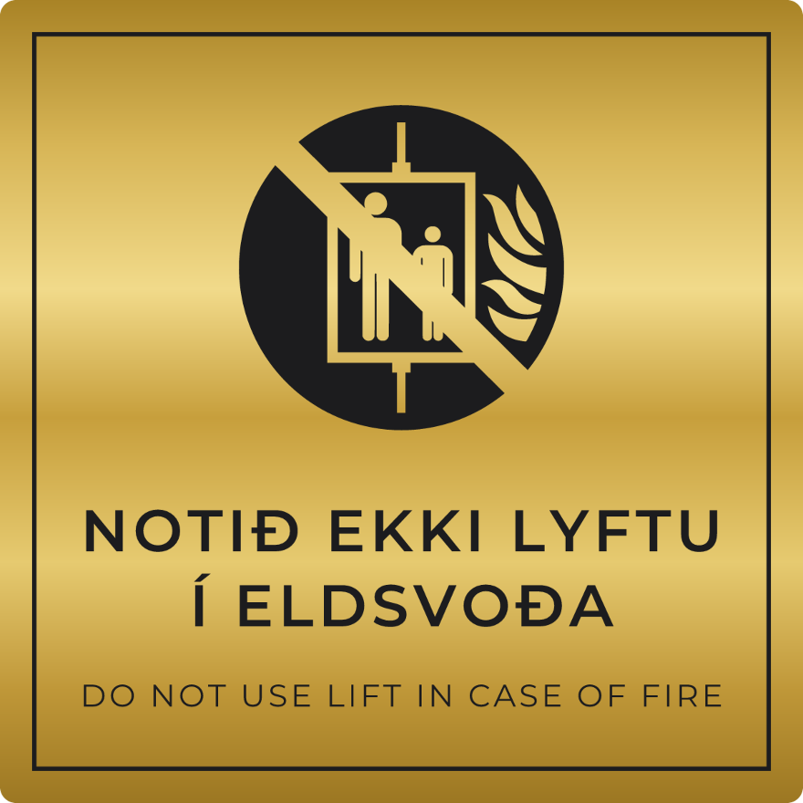 Notið ekki lyftu í eldsvoða - bannskilti, gull