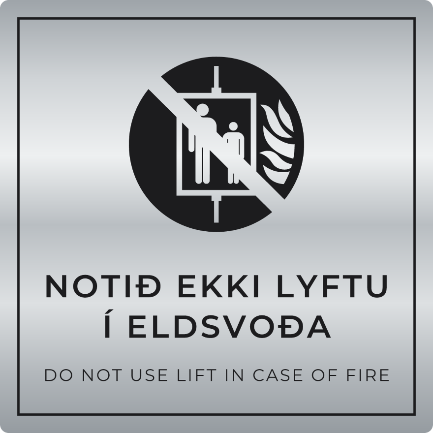 Notið ekki lyftu í eldsvoða - bannskilti, silfur