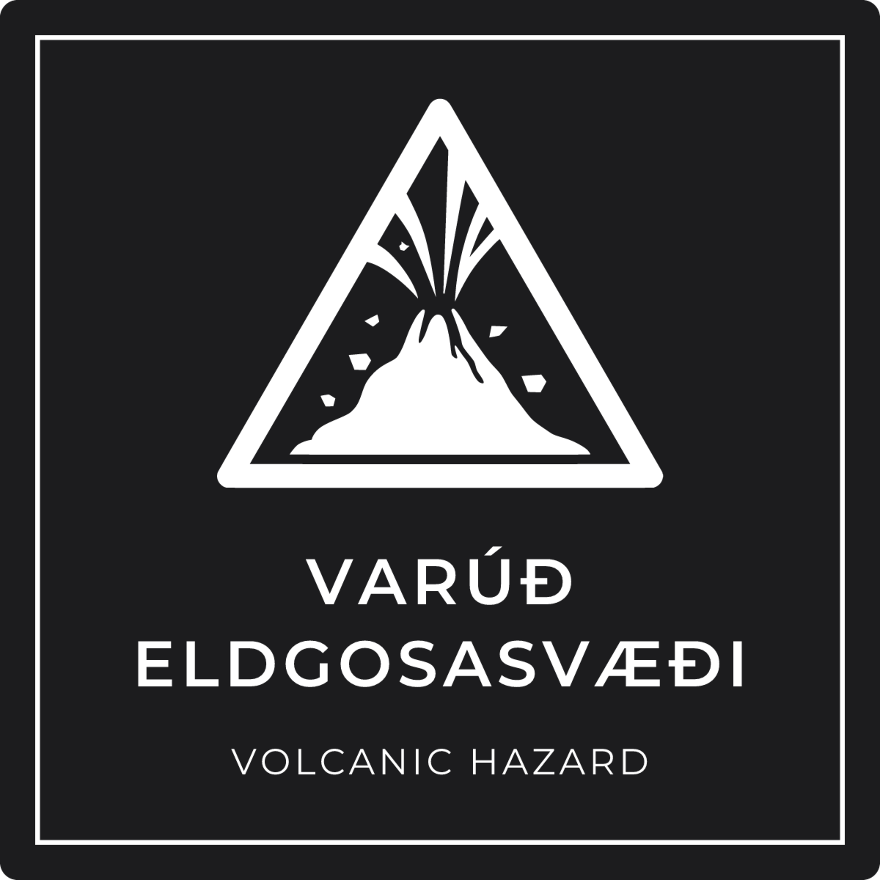 Varúð, eldgosasvæði - viðvörunarskilti, svart