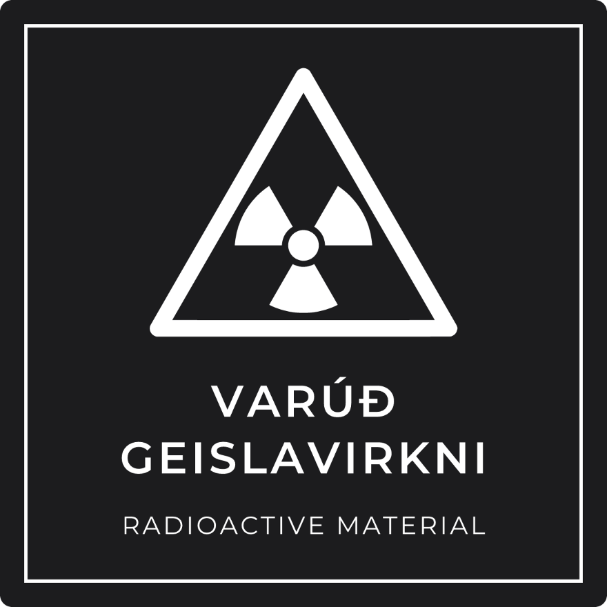 Varúð, geislavirkni - viðvörunarskilti, svart